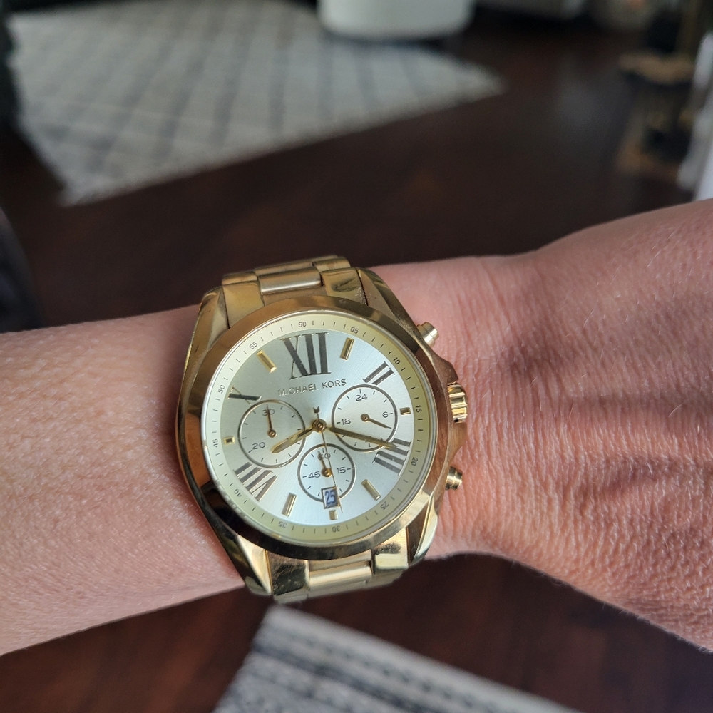 Michael Kors gold chunky watch. Good condition. Needs battery.